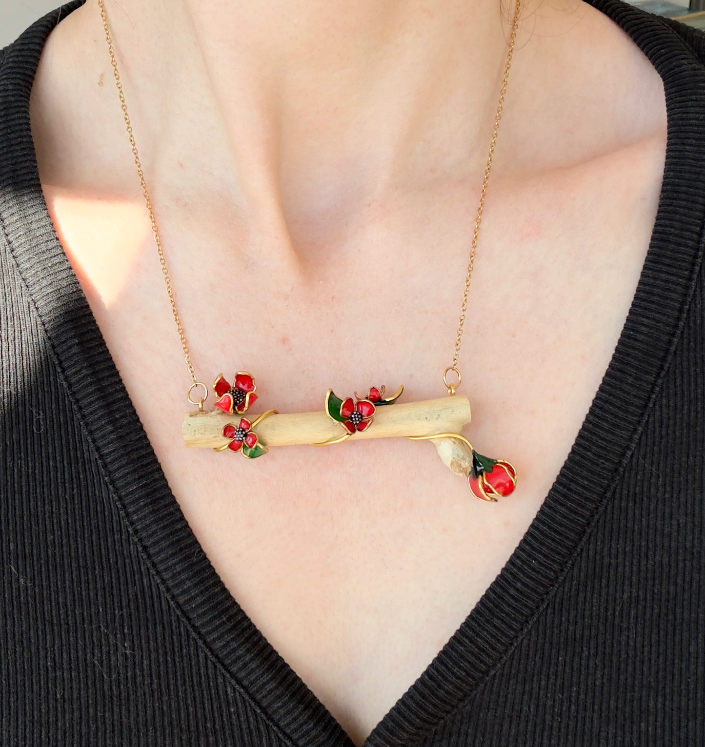 Colgante de ramita con flores