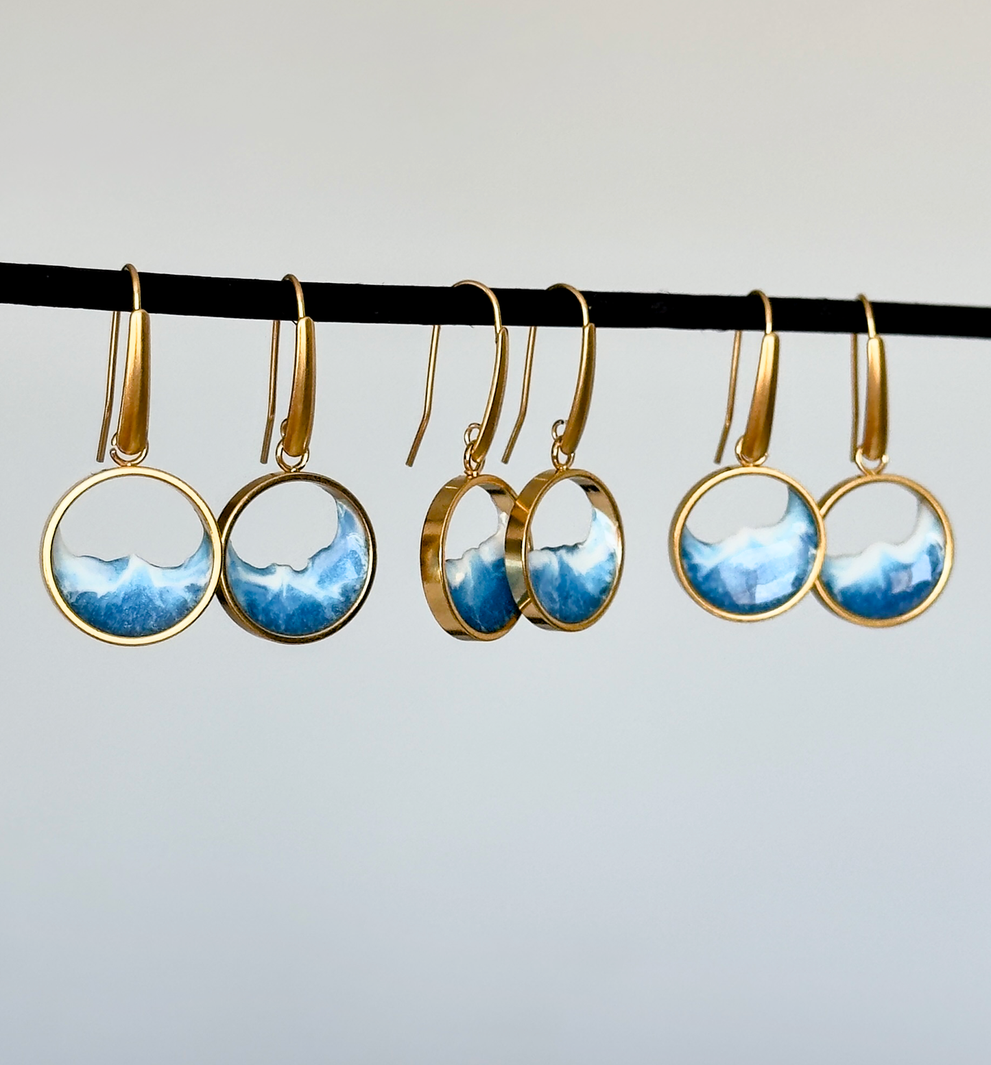 Pendientes de acero inoxidable con diseño de olas