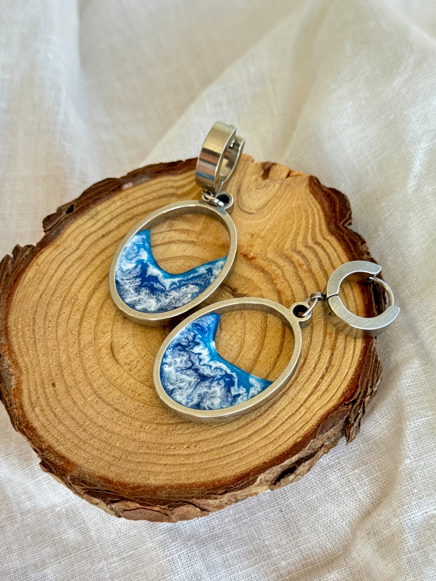 Stainless steel dangle earrings with waves