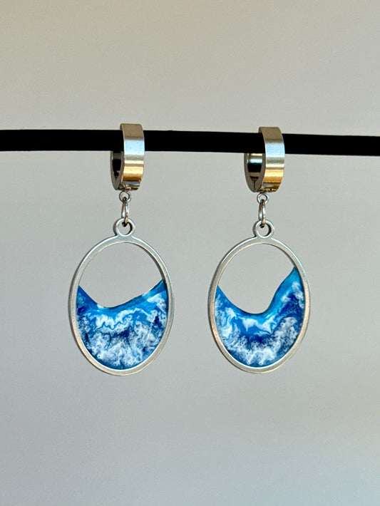 Stainless steel dangle earrings with waves