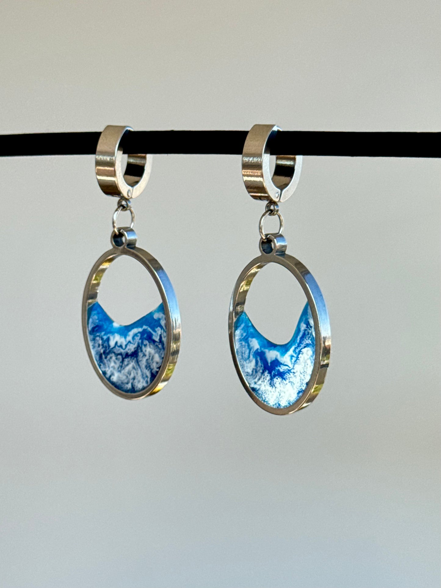 Stainless steel dangle earrings with waves