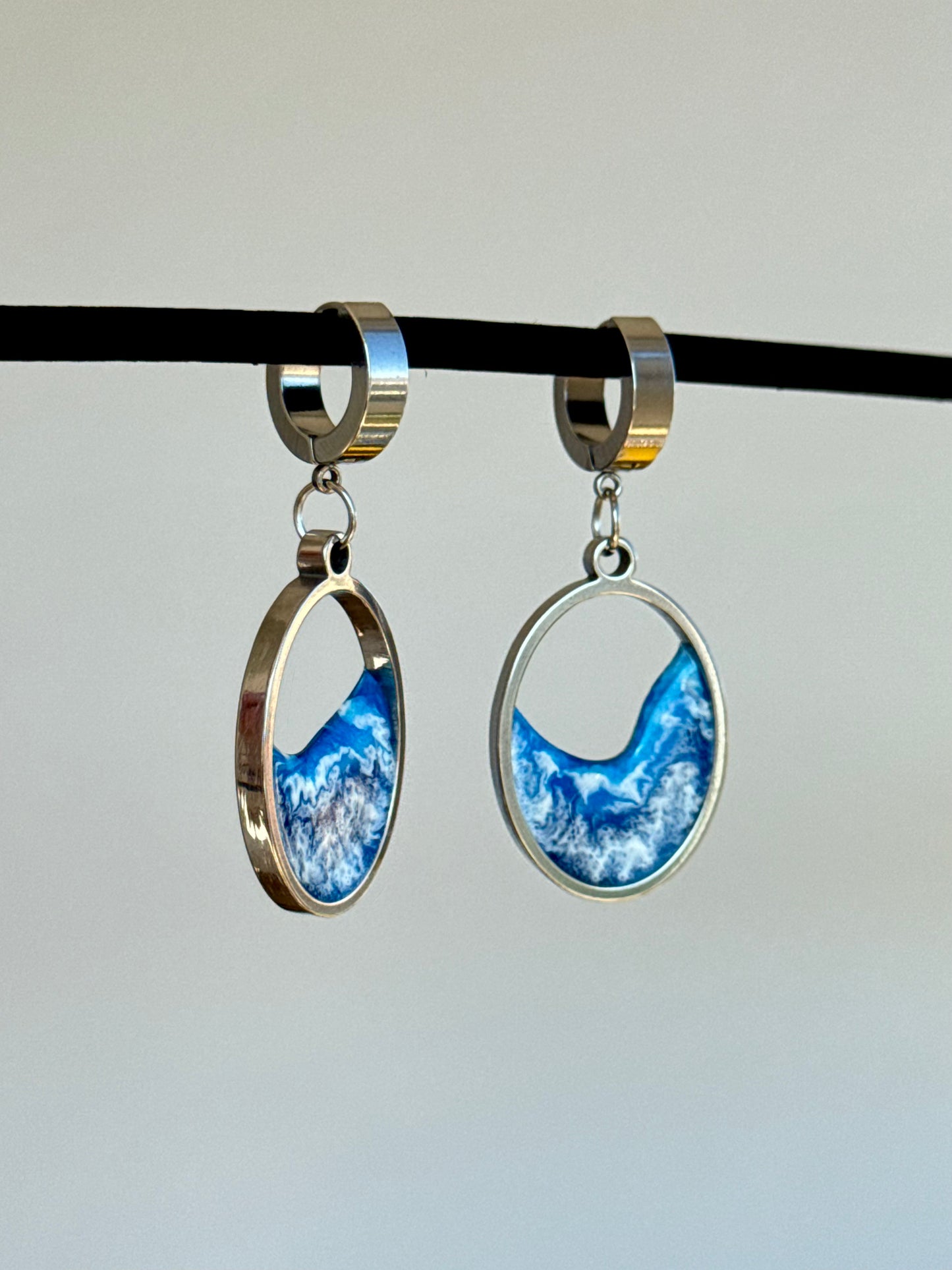 Stainless steel dangle earrings with waves