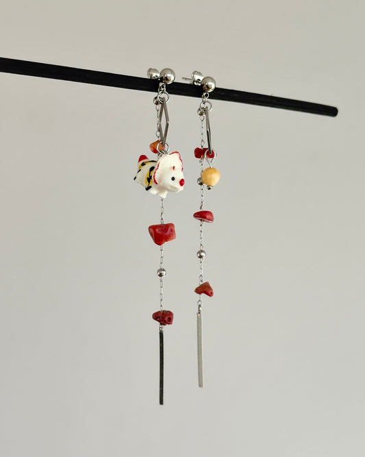 Pendientes largos de acero inoxidable con un dinosaurio y corales