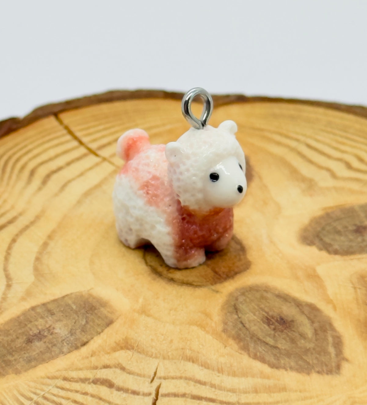 All pendants feature a miniature sheep animal and are hand-painted.