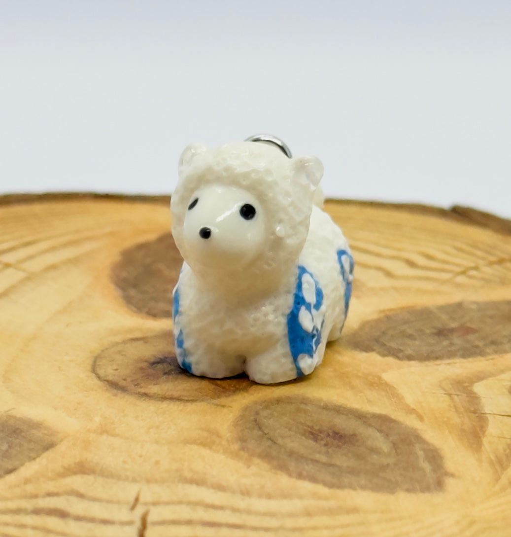 All pendants feature a miniature sheep animal and are hand-painted.