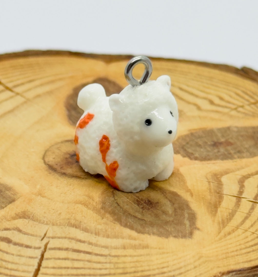 All pendants feature a miniature sheep animal and are hand-painted.