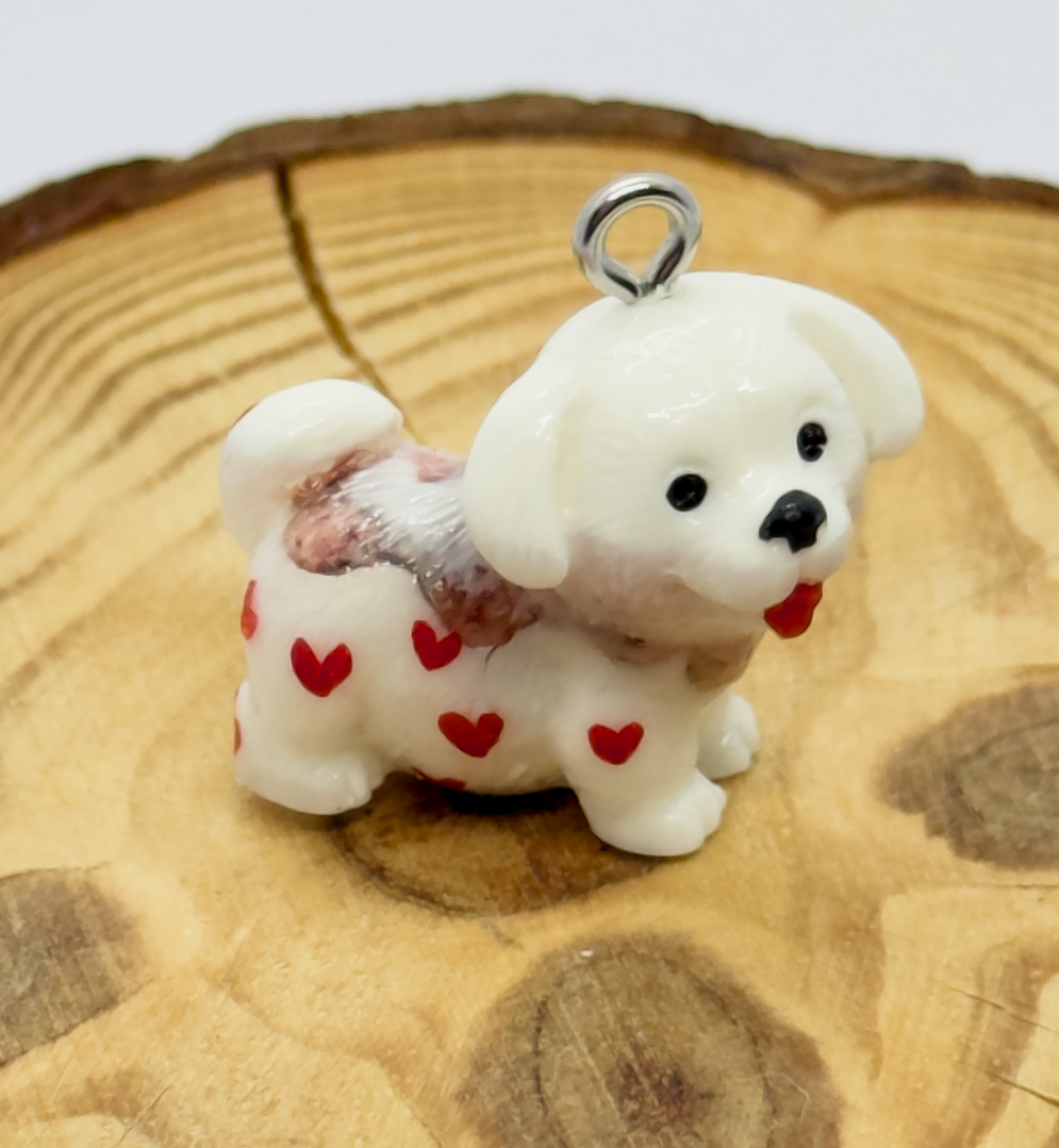 All pendants feature a miniature dog and hand-painted details.
