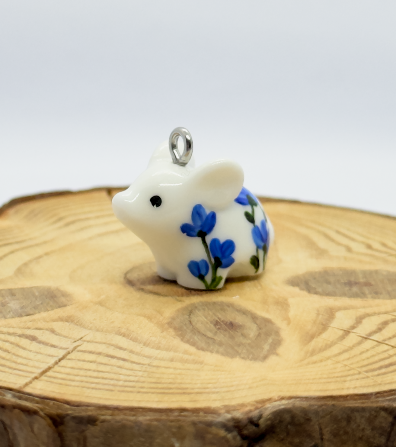 All the pendants feature a miniature piglet animal and are hand-painted.