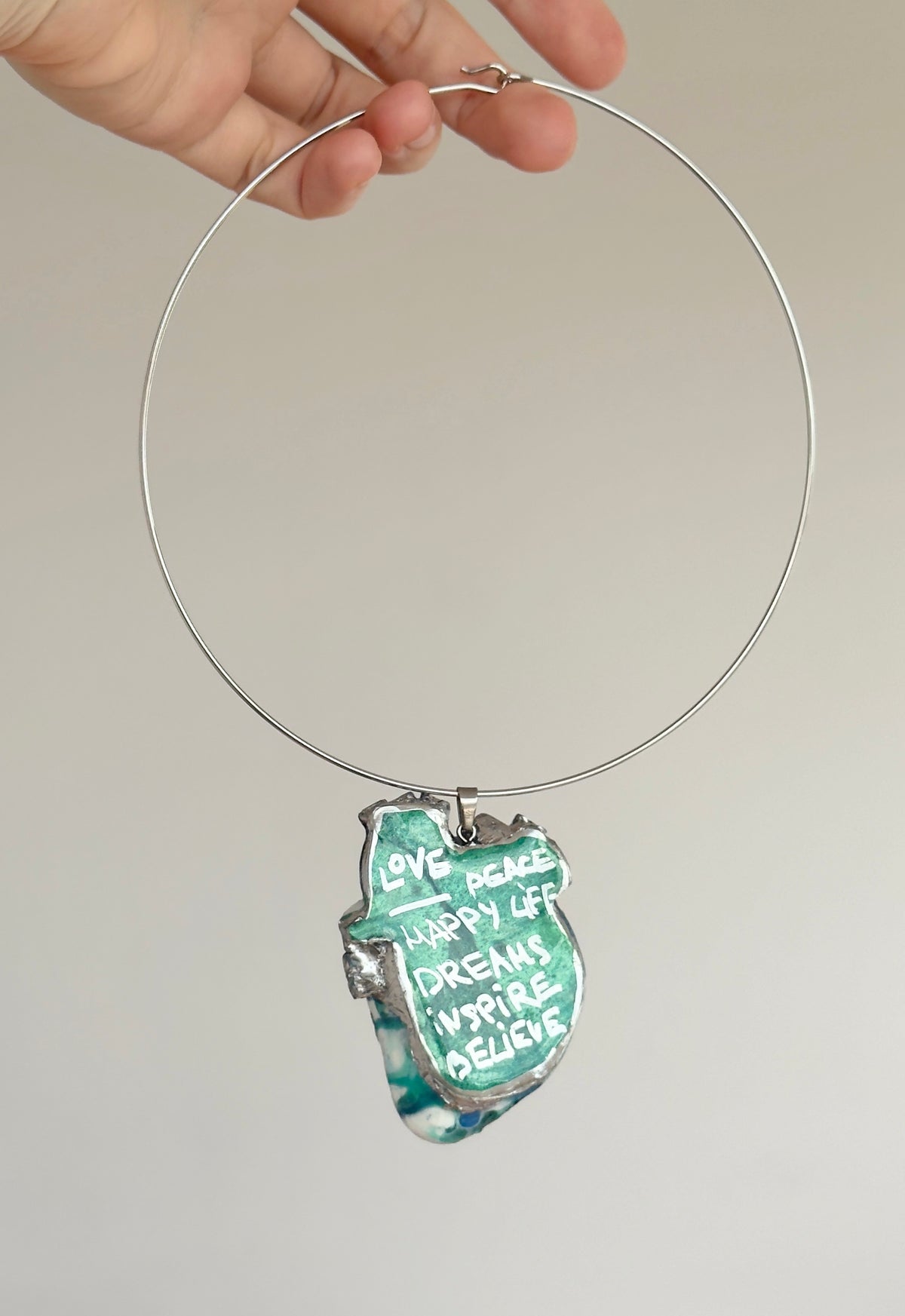 Large anatomical heart-shaped pendant, solid blue pendant