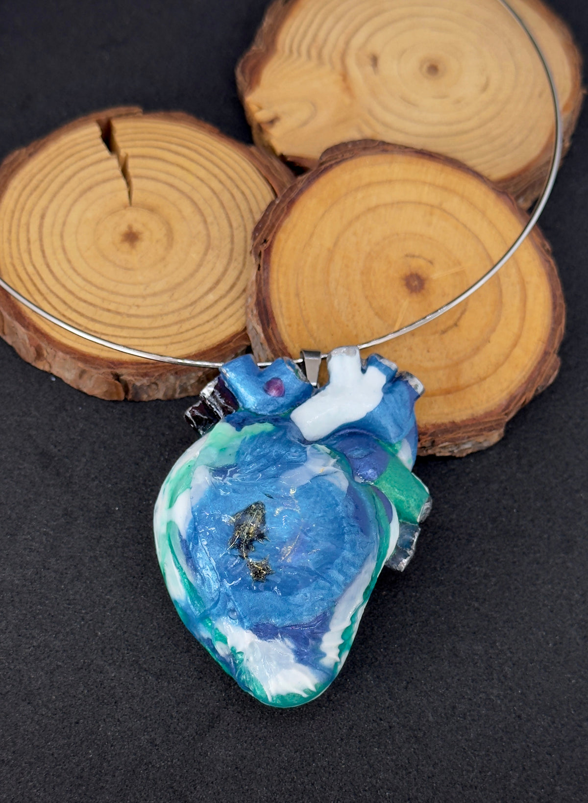 Large anatomical heart-shaped pendant, solid blue pendant