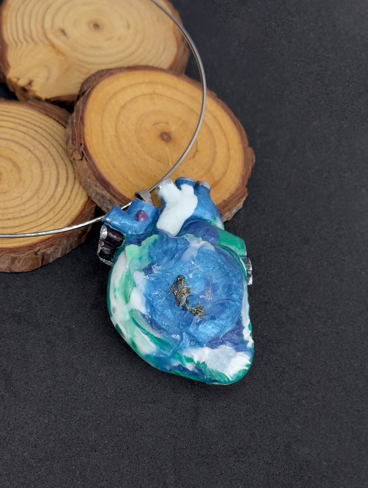 Large anatomical heart-shaped pendant, solid blue pendant