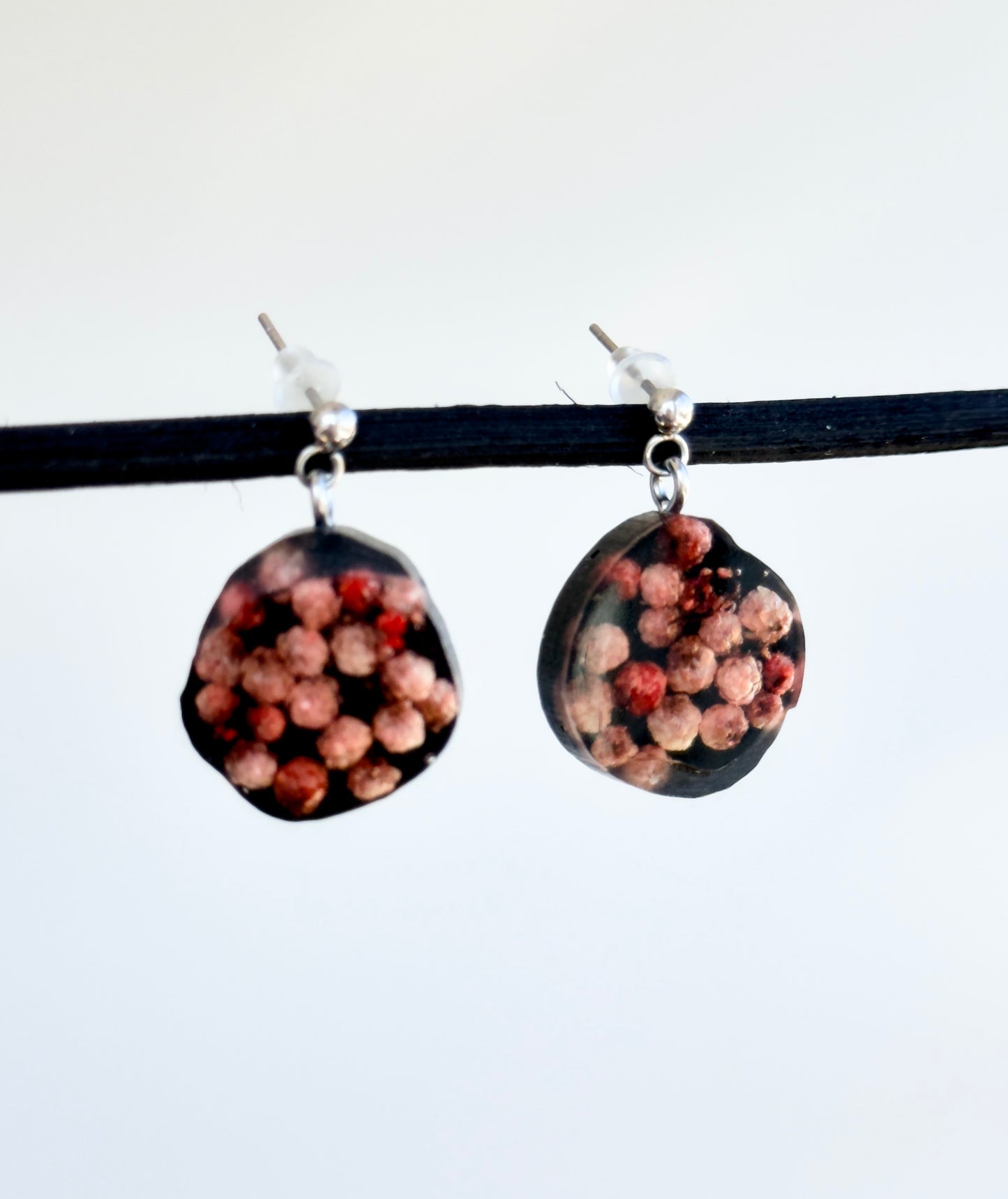 Black earrings with real flowers 