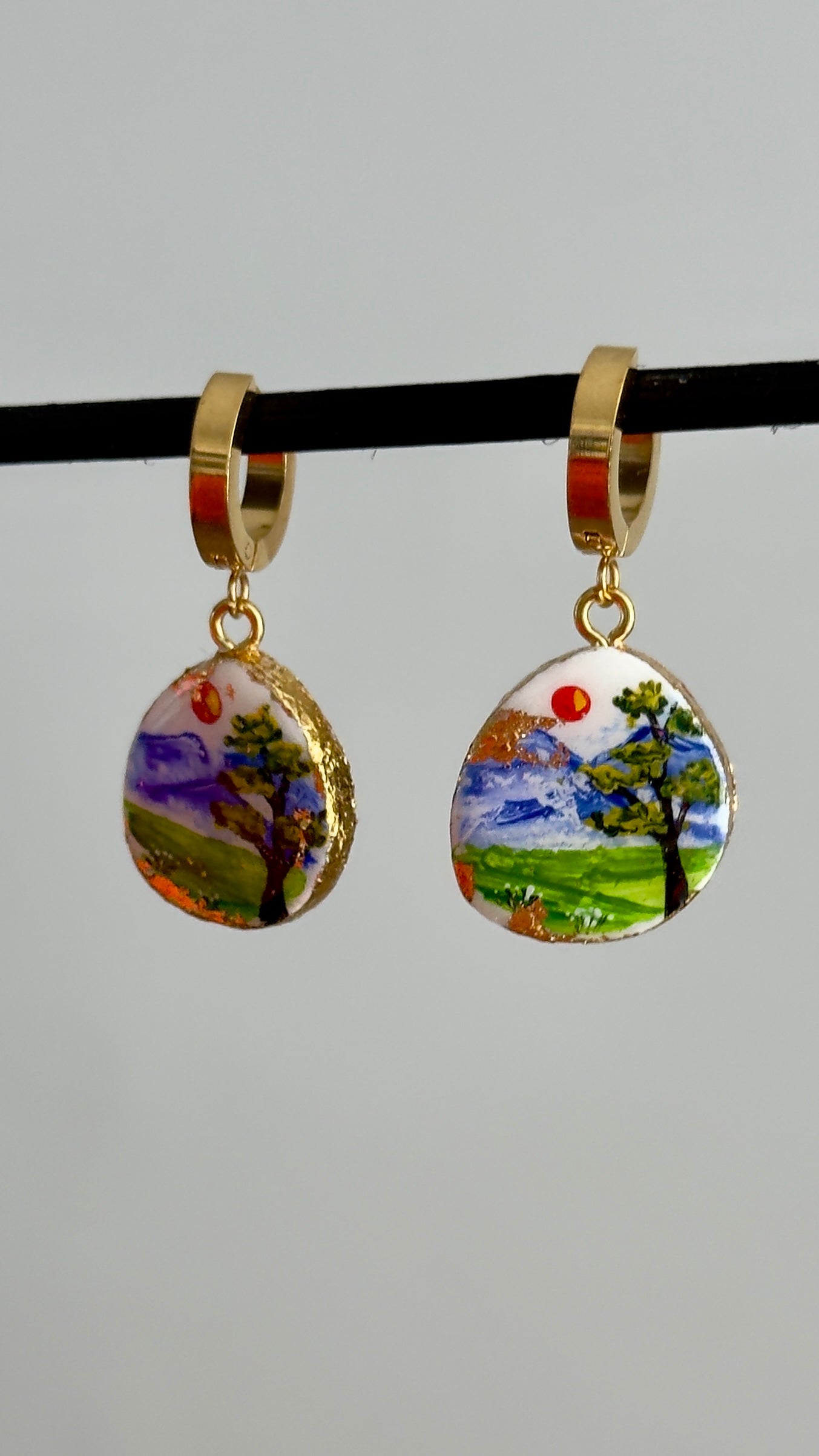 Pendientes blancos pintados