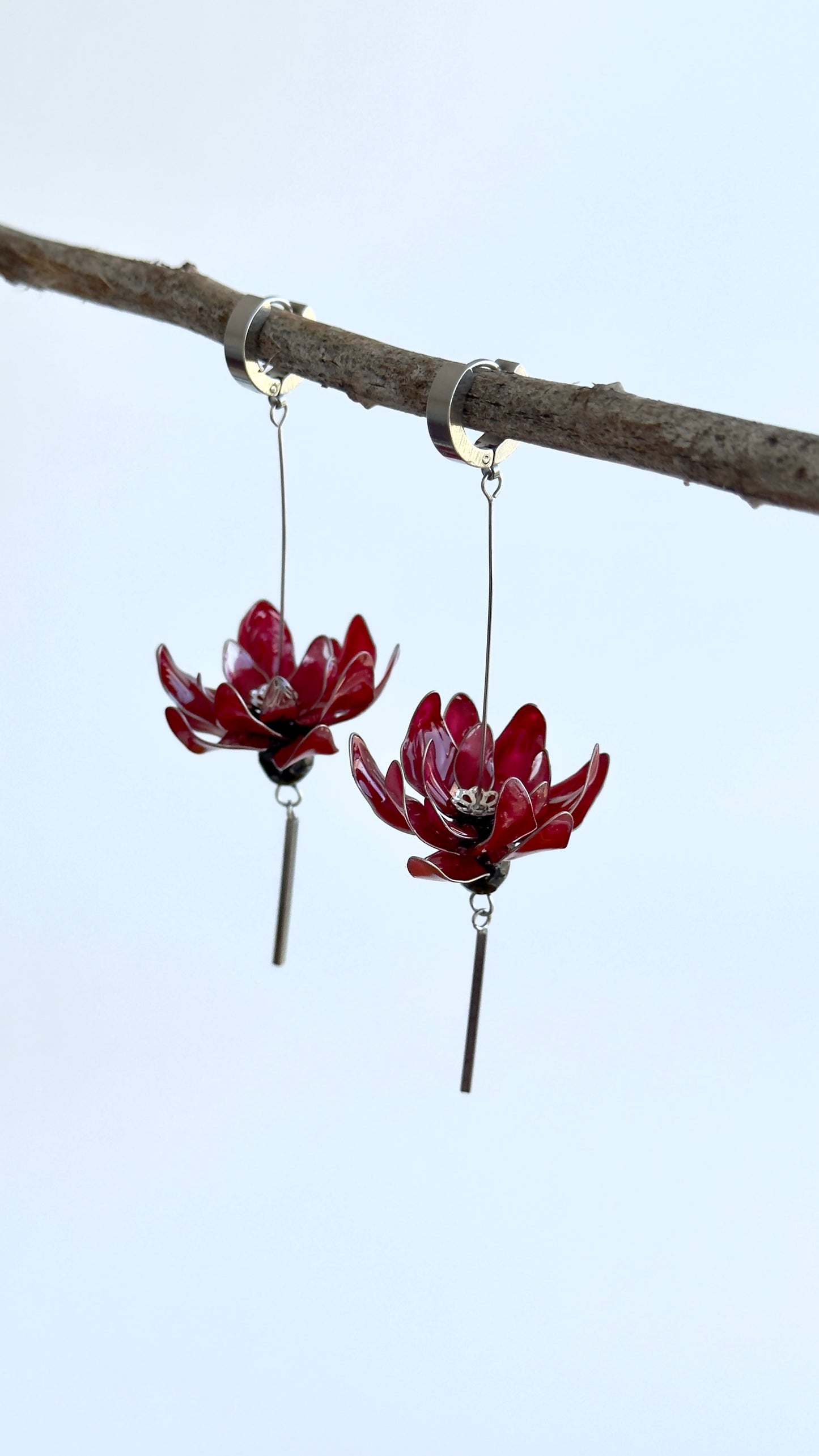 Pendientes con flores rojas