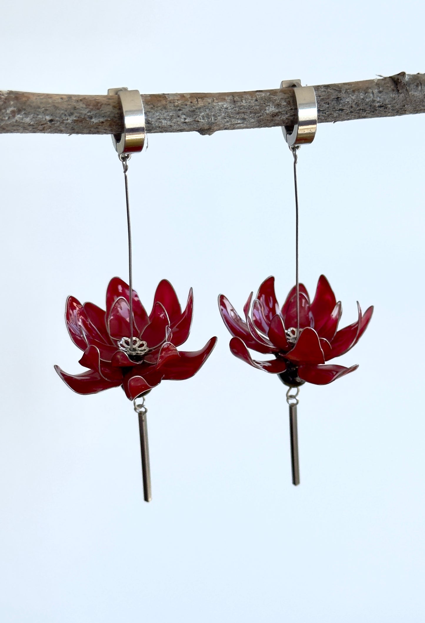 Pendientes con flores rojas