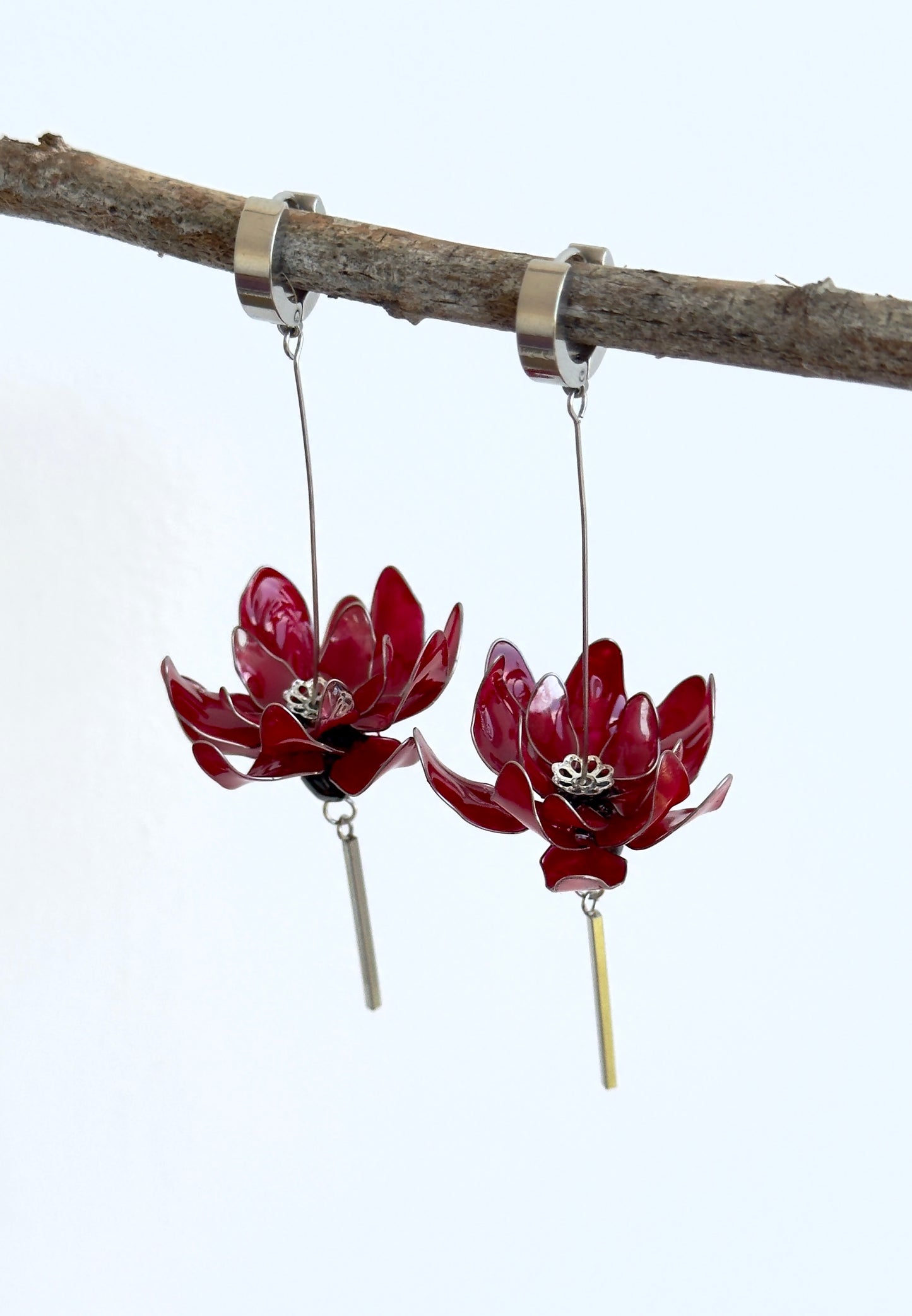 Pendientes con flores rojas
