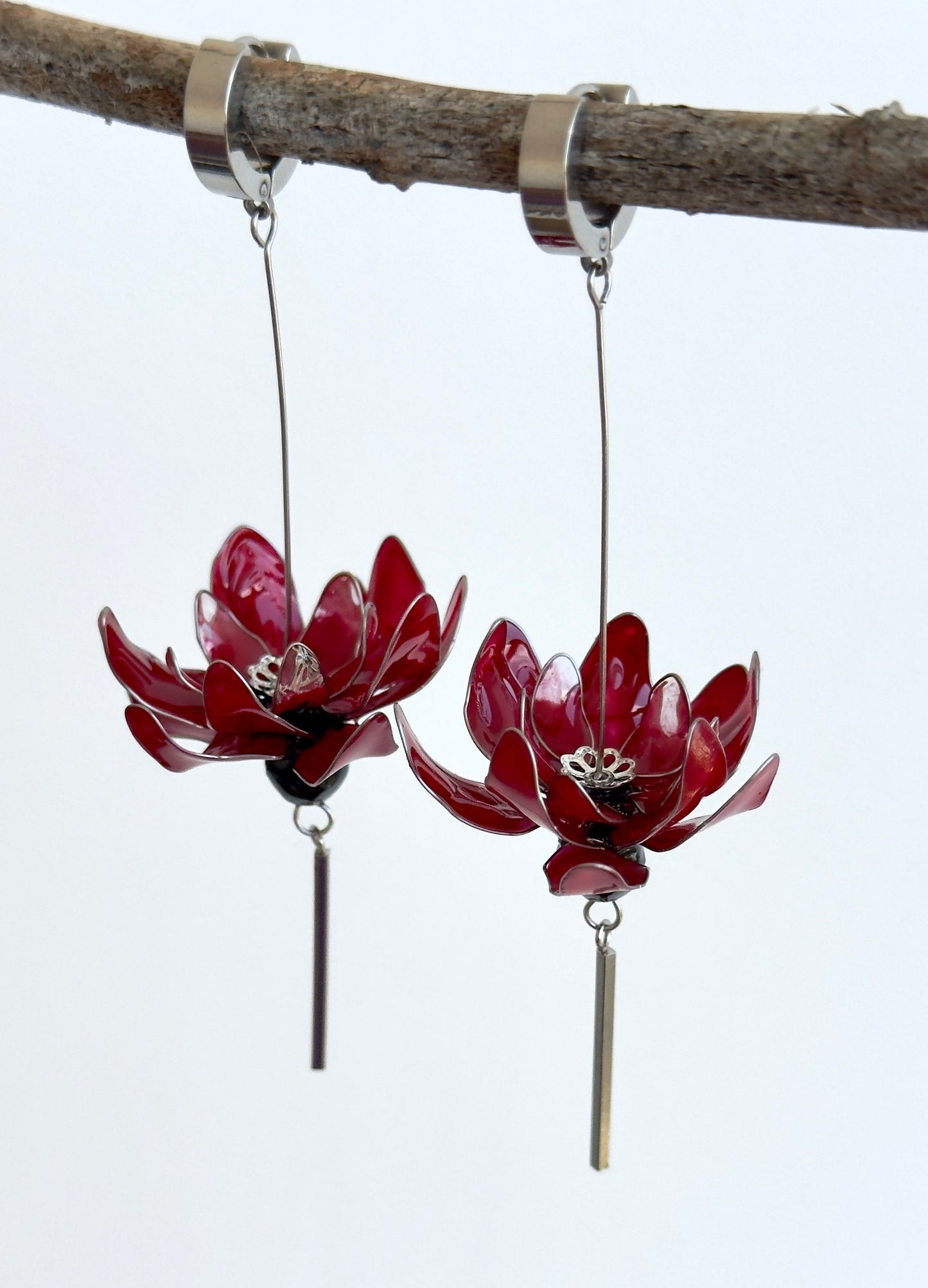 Pendientes con flores rojas