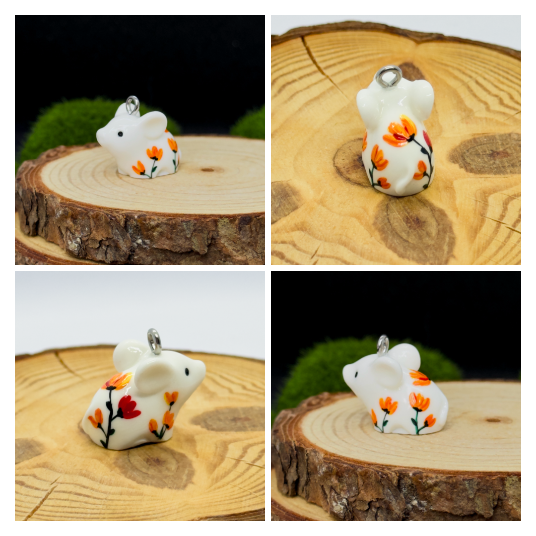 All the pendants feature a miniature piglet animal and are hand-painted.