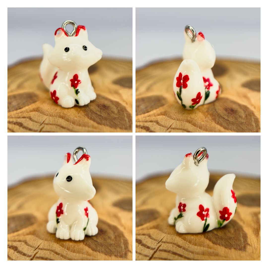 All pendants feature a miniature fox animal and hand-painted details.