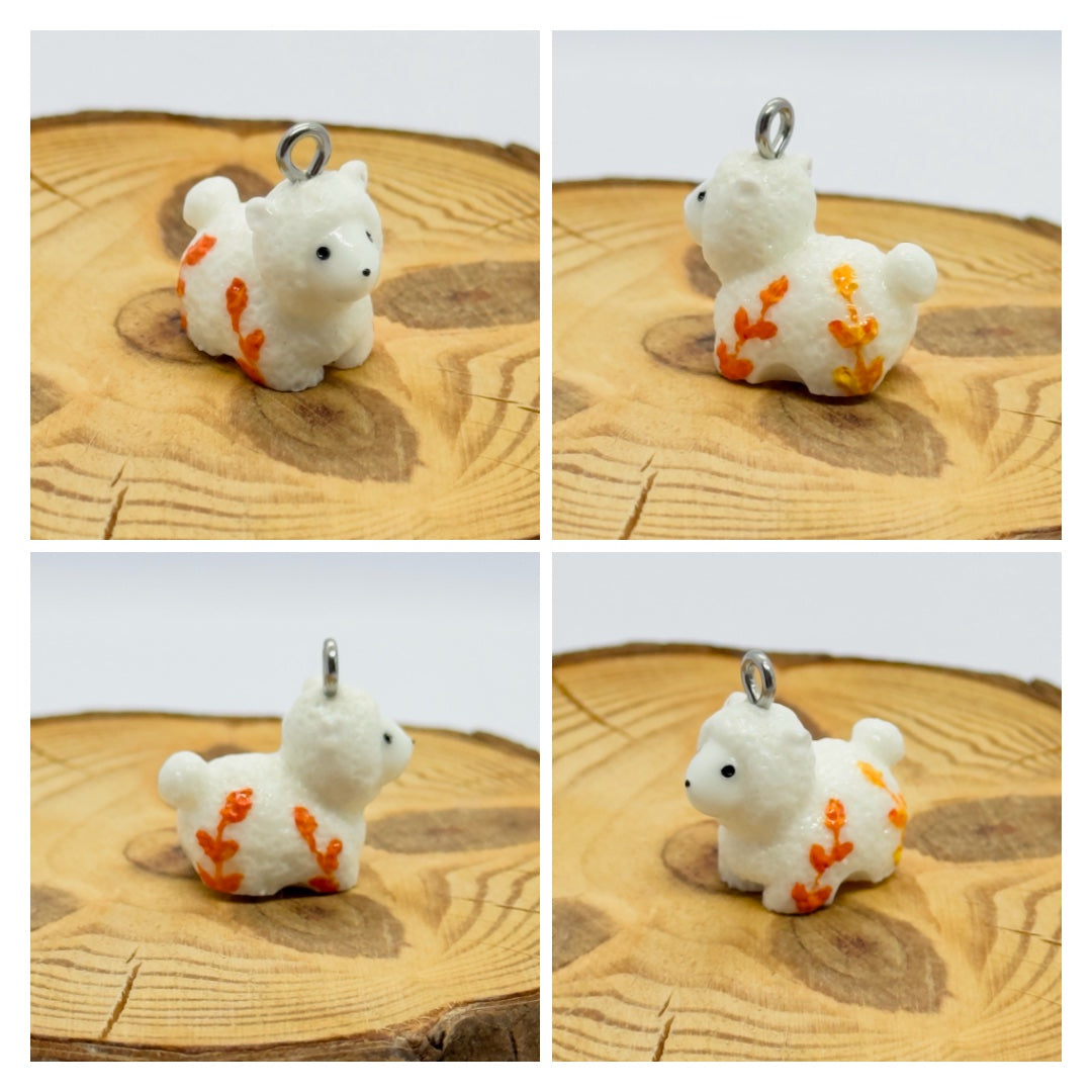 All pendants feature a miniature sheep animal and are hand-painted.