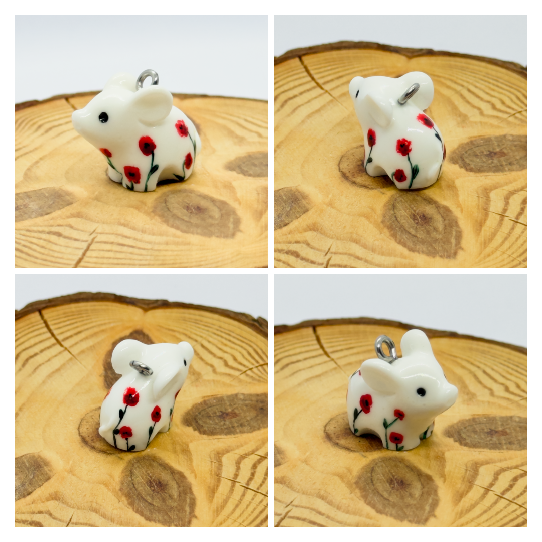 All the pendants feature a miniature piglet animal and are hand-painted.
