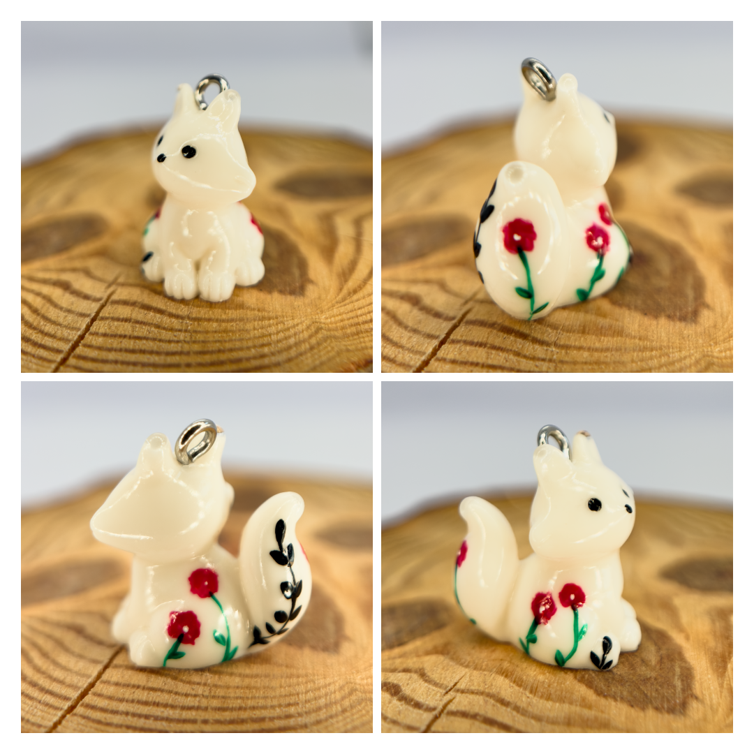 All pendants feature a miniature fox animal and hand-painted details.