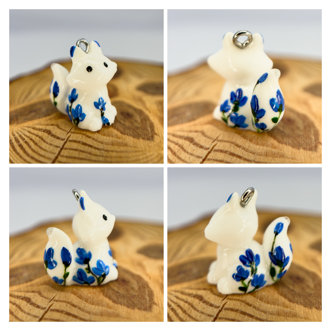 All pendants feature a miniature fox animal and hand-painted details.