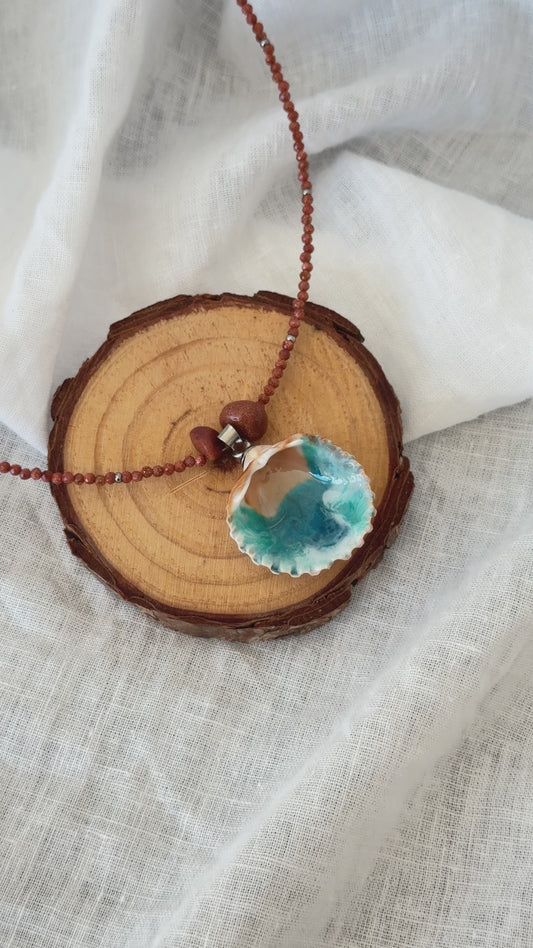 Colgante concha con motivos marinos